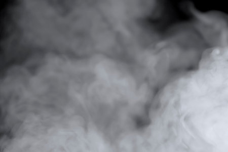 Abstract white smoke isolated on black background.の写真素材