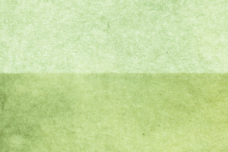 green paper texture background for design with copy space for text or image.の写真素材