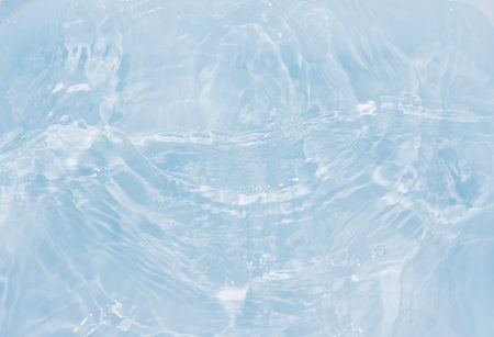 close up of blue water surface in swimming pool with waves and bubbles