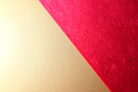 Red and gold paper texture background with copy space for text or image.の写真素材