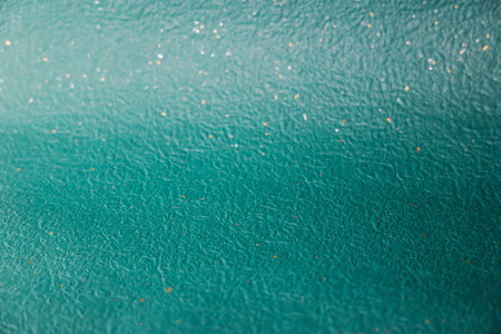 Green paper background. Abstract textured background. Copy space.の写真素材