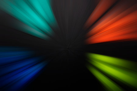 abstract color background with motion blur and rays of light, black backgroundの写真素材