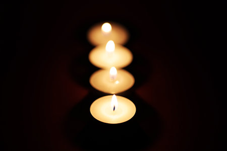 Candles on a black background.の写真素材