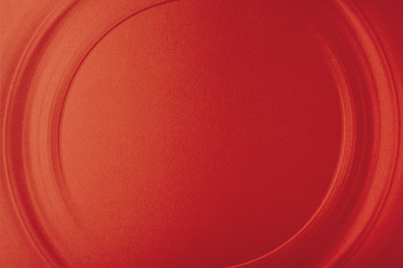 close up of red paper texture background with copy space for text or imageの写真素材