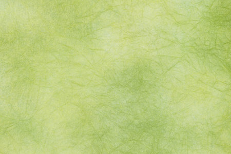 Japanese paper. Green paper texture background with space for text or image. High quality photoの写真素材