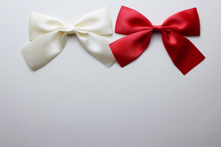 White and red bow on white background.の写真素材