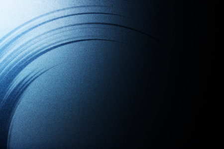 abstract blue background with some smooth lines in it and some reflectionsの写真素材