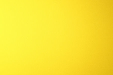 Yellow background with copy space for text or image. Flat lay.