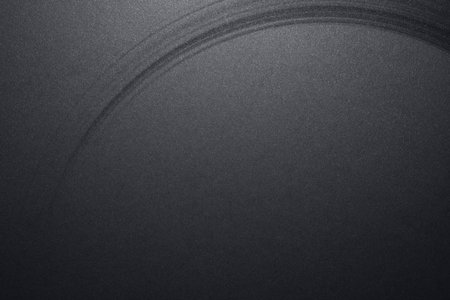 abstract black background texture with some smooth lines and highlights in itの写真素材