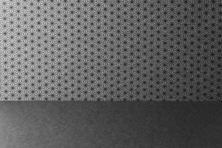 Japanese paper background with hemp leaf pattern in black and gray tone.の写真素材