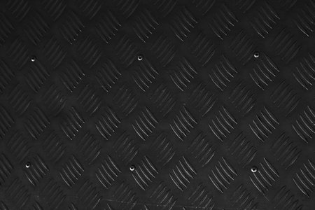 Black metal texture useful as a background.