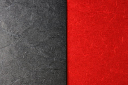 Red and black paper background with copy space for text or image.の写真素材