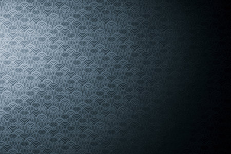 blue wallpaper with a pattern of curves and waves on a dark backgroundの写真素材