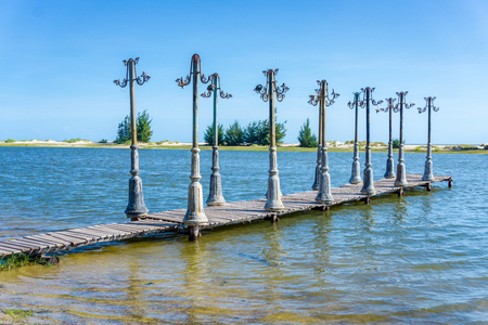 Wood pier and the light posts decoration の写真素材