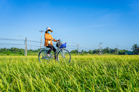 Woman ride meadowの写真素材
