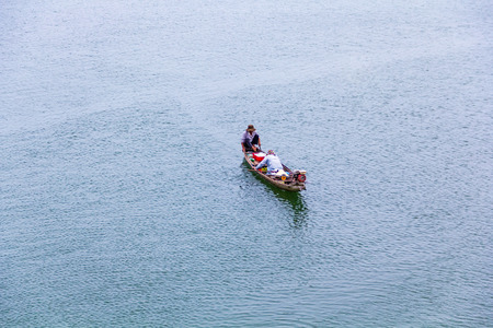 Two people rowing in boatのeditorial素材