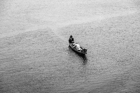 Two people rowing in boat. Black and whiteのeditorial素材