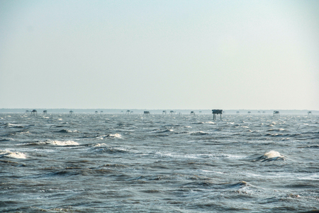 Group of small houses in seaの写真素材