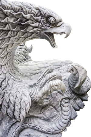 Eagle attack snack statue isolated on white backgroundの写真素材