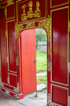Red door in Hue's Imperial City Vietnamのeditorial素材