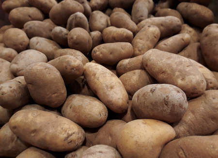 Raw potatoes  vegetables background in supermarket