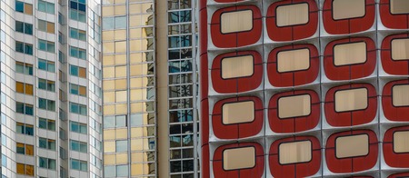 Abstract architectural detail of the windows of a tall buildingの写真素材