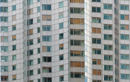 Abstract architectural detail of the windows of a tall building
