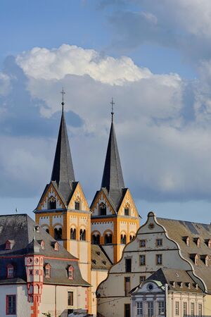 Roof tops and double church towers in a city of Koblenz, Germanyの写真素材