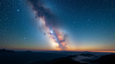 Milky way over the mountain at night with beautiful starry sky.