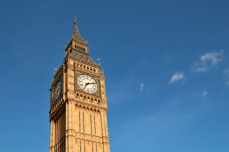 Big ben in London against the blue sky.