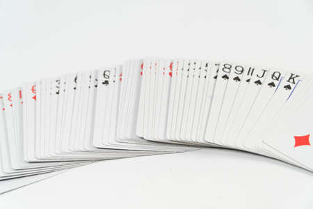 Playing cards on a white background. Close-up. High quality photoの写真素材