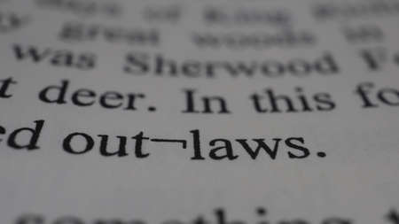 Dictionary definition of the word outlaw. Close-up.の写真素材