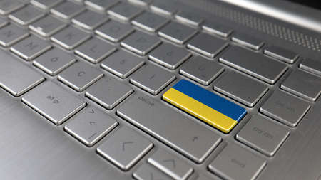 Ukrainian flag on the laptop keyboard. Editorial 3D rendering
