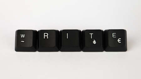 The wordWRITES written with black keyboard keys on white backgroundの写真素材