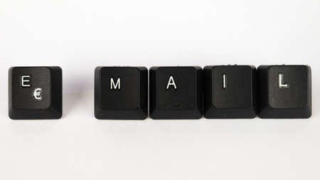 Keyboard keys with the word EMAIL on a white background