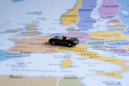 Toy car on the map of Europe. Travel concept. Selective focus.の写真素材