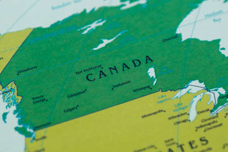 Close-up of the map of Canada on the table.