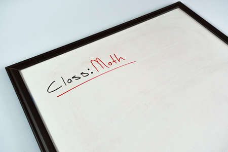 Close up of a black board with the word crisis written on itの写真素材