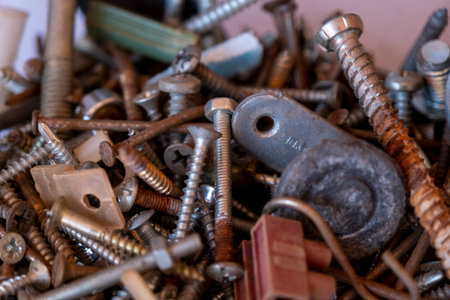 Screws, nuts and bolts close-up. Industrial background.
