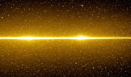 Gold glitter, gold particles on black background, Magic gold dust and glare. Happy new year holiday concept. golden rain. Abstract falling golden lights.の写真素材