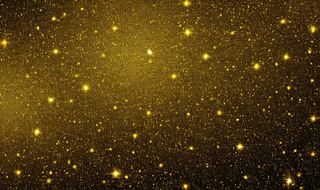 Gold glitter, gold particles on black background, Magic gold dust and glare. Happy new year holiday...
