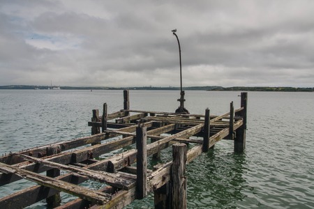 View over an old pier in Cobh Irelandの写真素材