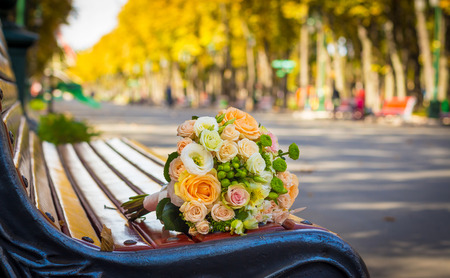 wedding bouquet on the benchの写真素材