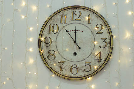 The clock at five minutes to twelveの写真素材