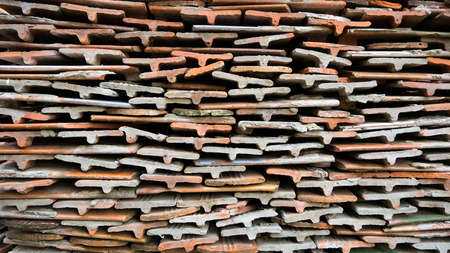 Stone tiles of different shades are stacked in a large pile. Background image. Building material.の写真素材