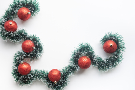 Christmas celebration concepts with pine branch and red ball  ornament on white backgroundの写真素材