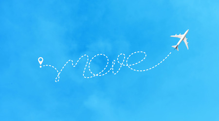 Travel and journey concepts with airplane and move text on sky location.Vacation and summer ideasの写真素材