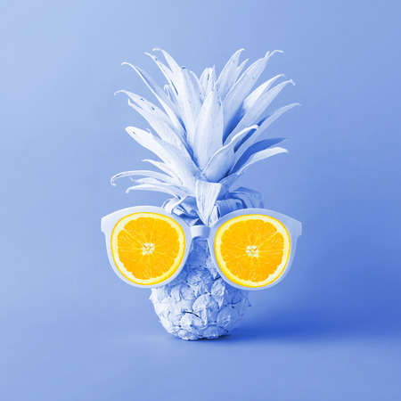 Summer holiday concepts with exotic pineapple and sunglasses in pastel color,backgroundの写真素材