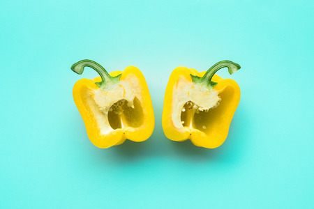 Yellow of bell pepper,chilli slice in pastel background