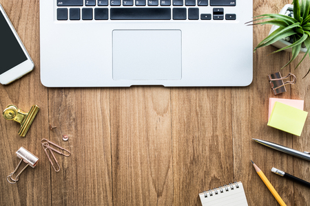 Top view of office desk table with modern laptop and accessories objects on wooden.Business,education concepts ideas/flat lay designの写真素材